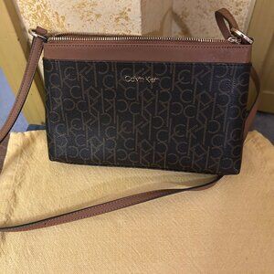Calvin Klein  Brown w logo CK print crossbody bag  7x10 3 pocket's inside